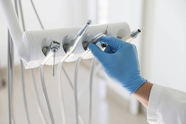 Professional Tooth Extraction technician working in Tillson, NY